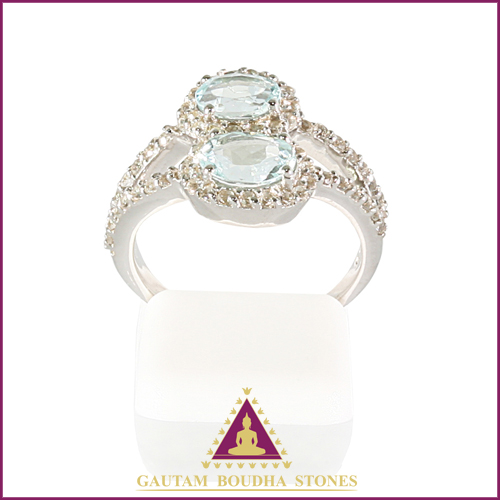 Bague en argent 925, deux aigues-marines entourées de topazes blanches Bague en argent 925, deux aigues-marines entourées de topazes blanches