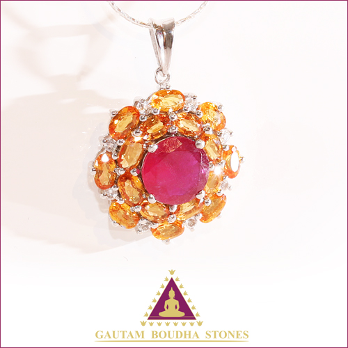 Pendentif en argent 925. Citrine et rubis. Hauteur 1,5cm Pendentif en argent 925. Citrine et rubis. Hauteur 1,5cm