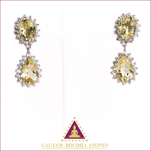Boucles d'reilles en argent 925. Citrine et topazes blanches. Longueur 3,5cm Boucles d'reilles en argent 925. Citrine et topazes blanches. Longueur 3,5cm